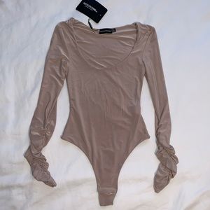 NWT PRETTYLITTLETHING NUDE BODYSUIT SIZE 2